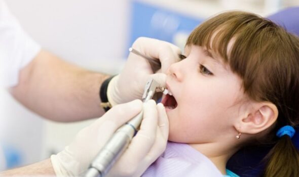 Dental crown and root canal for kids